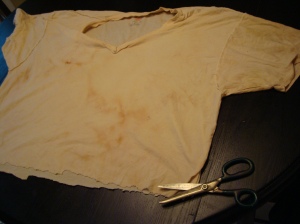First I stretched out the shirt and cut it into strips.